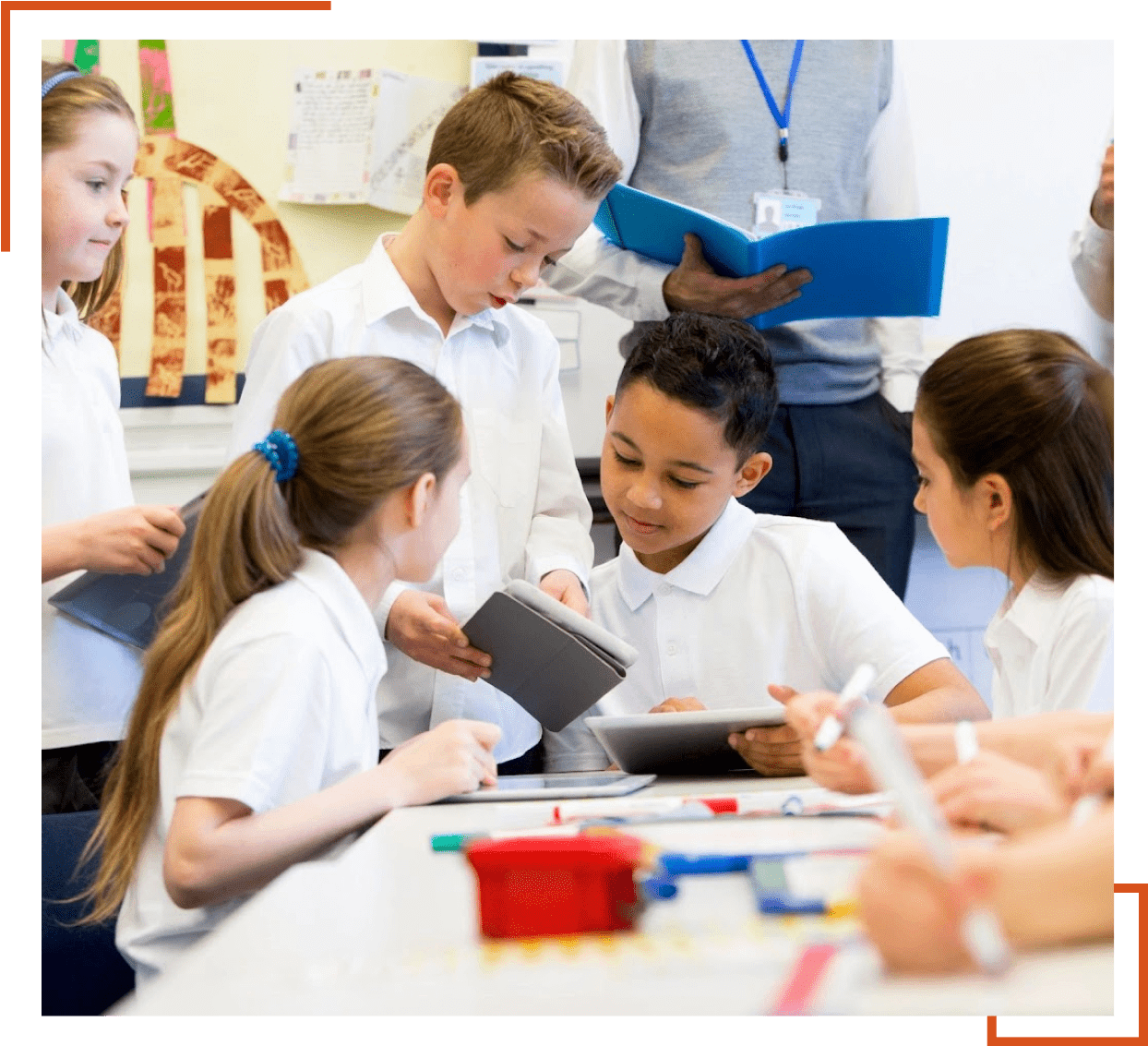 Group 1321314603 Children collaborating in a classroom setting.