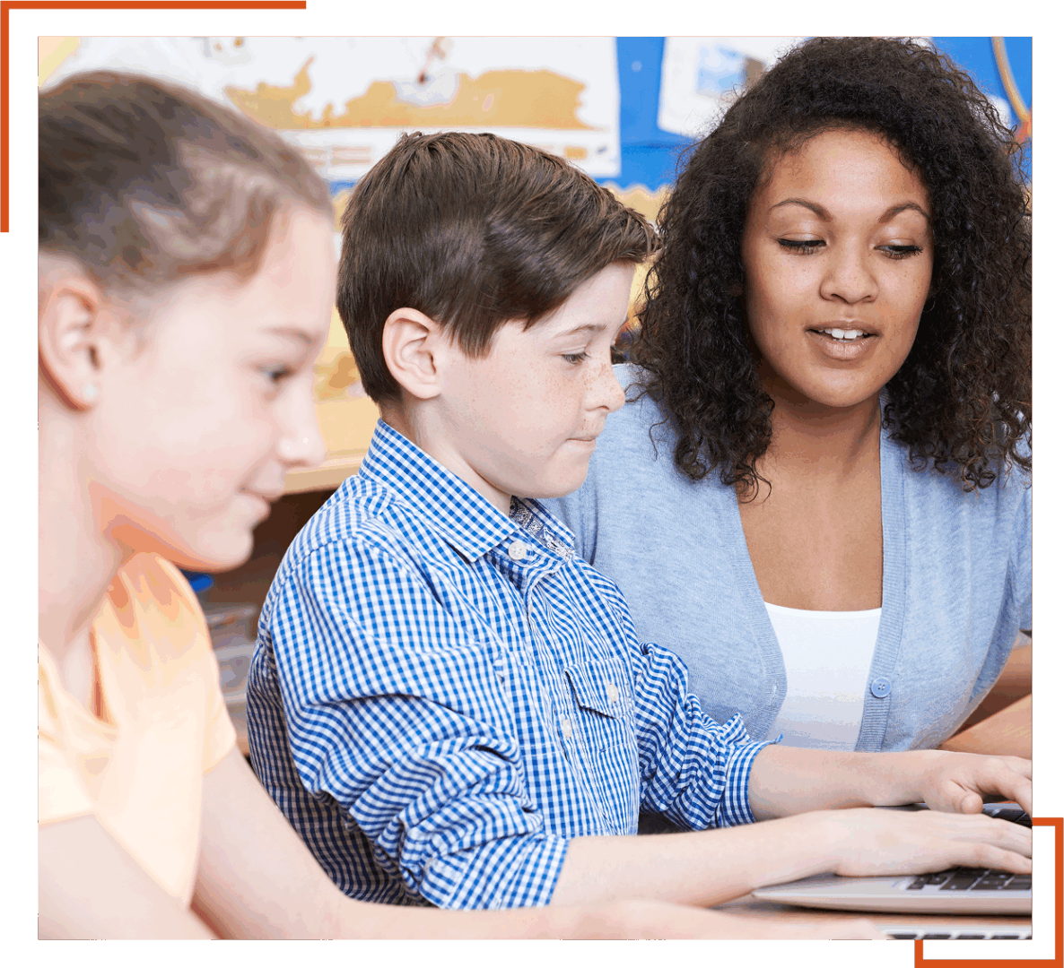 Teacher helping children with a learning activity.