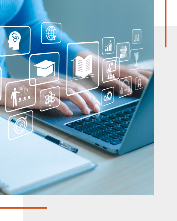 Person typing with digital education icons overlay.